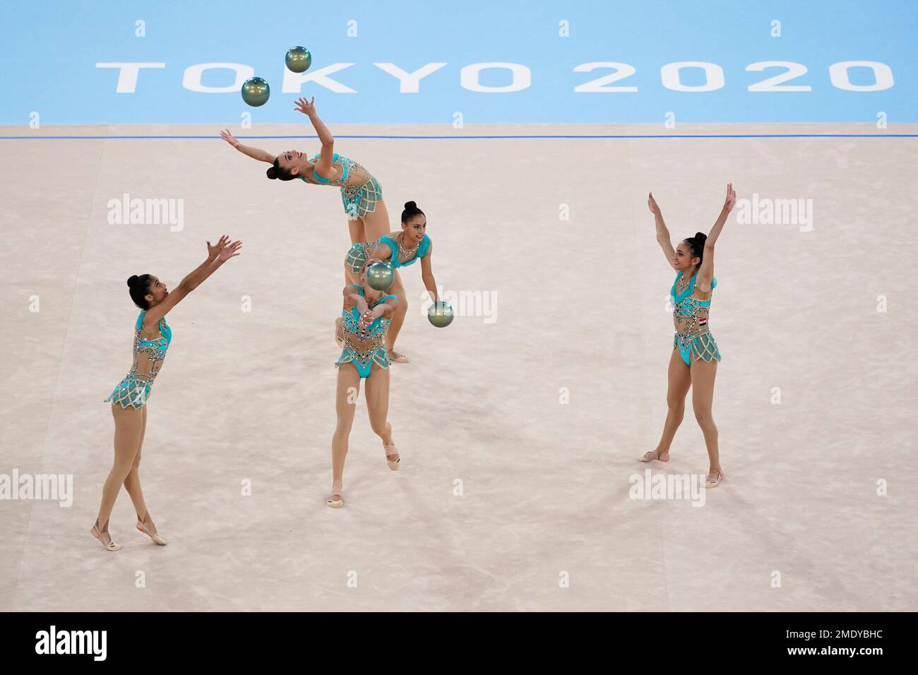 Gymnasts from Egypt perform during the rhythmic gymnastics group all
