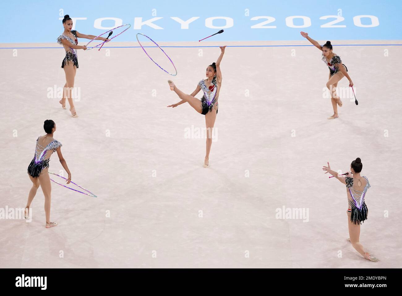 Gymnasts from Egypt perform during the rhythmic gymnastics group all