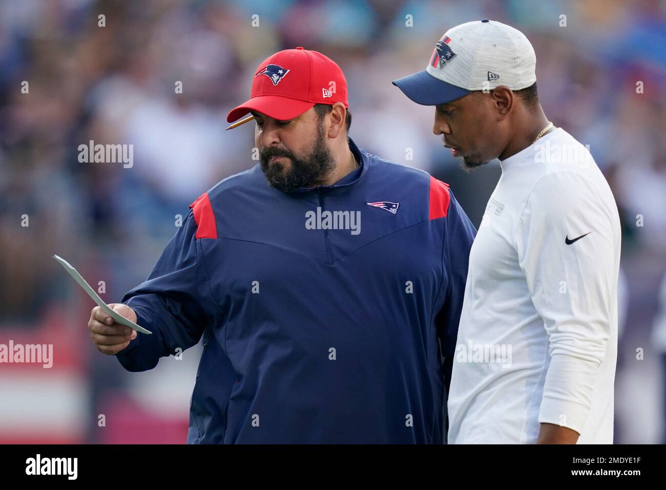 New England Patriots senior football advisor Matt Patricia, left, and