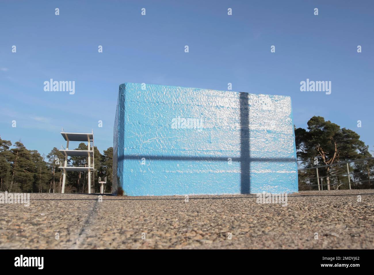 Public swimming pool shot empty in summertime. Old pool represents functionalism and was under a threat of demolition. Stock Photo
