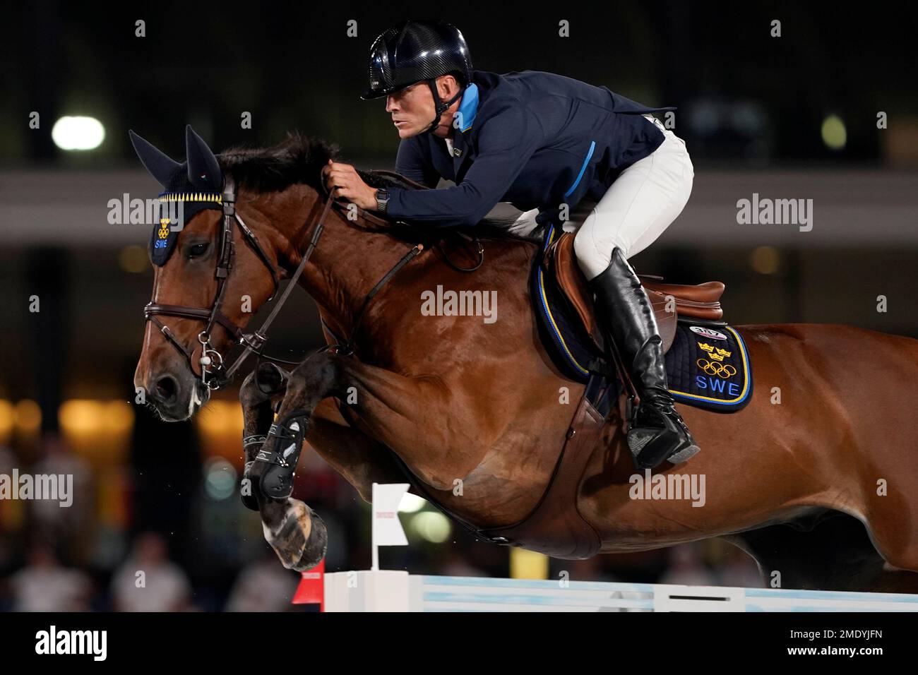 Sweden's Peder Fredricson, riding H&M All In, competes during the equestrian  jumping team qualifying at Equestrian Park in Tokyo at the 2020 Summer  Olympics, Friday, Aug. 6, 2021, in Tokyo, Japan. (AP