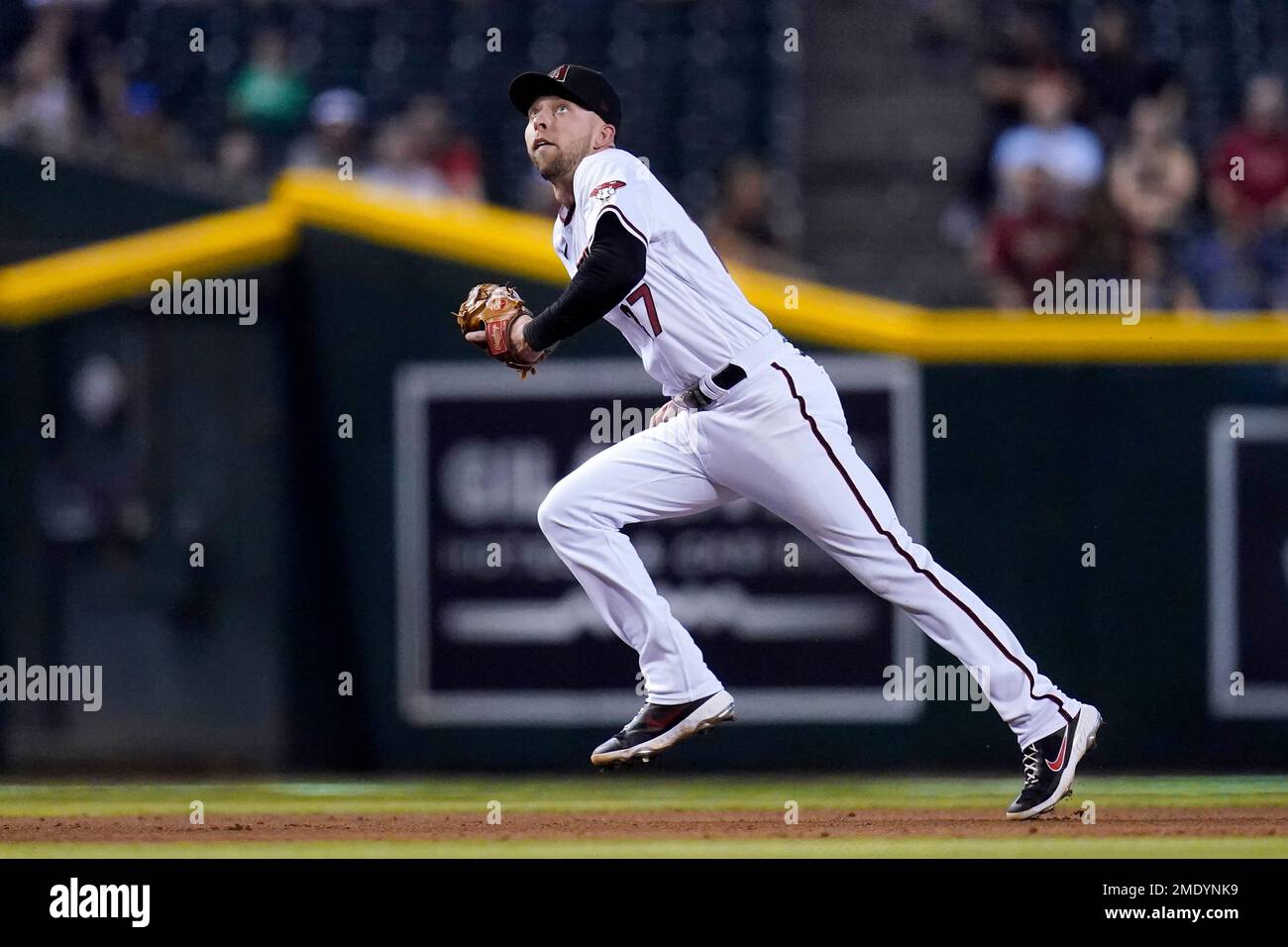 Arizona Diamondbacks third baseman Drew Ellis warms up during the first  inning of a spring training baseball game against the San Francisco Giants  Wednesday, March 23, 2022, in Scottsdale, Ariz. (AP Photo/Ross