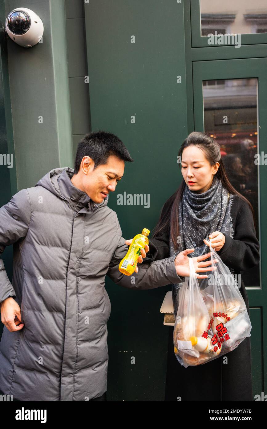 Asian couple shopping in China town in London, England, UK Stock Photo