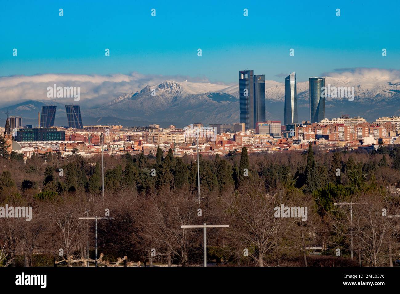 Madrid. Pollution. Contamination. Views of the city of Madrid with a gray and brown layer of pollution beret over the city. Sierra de Guadarrama with Stock Photo