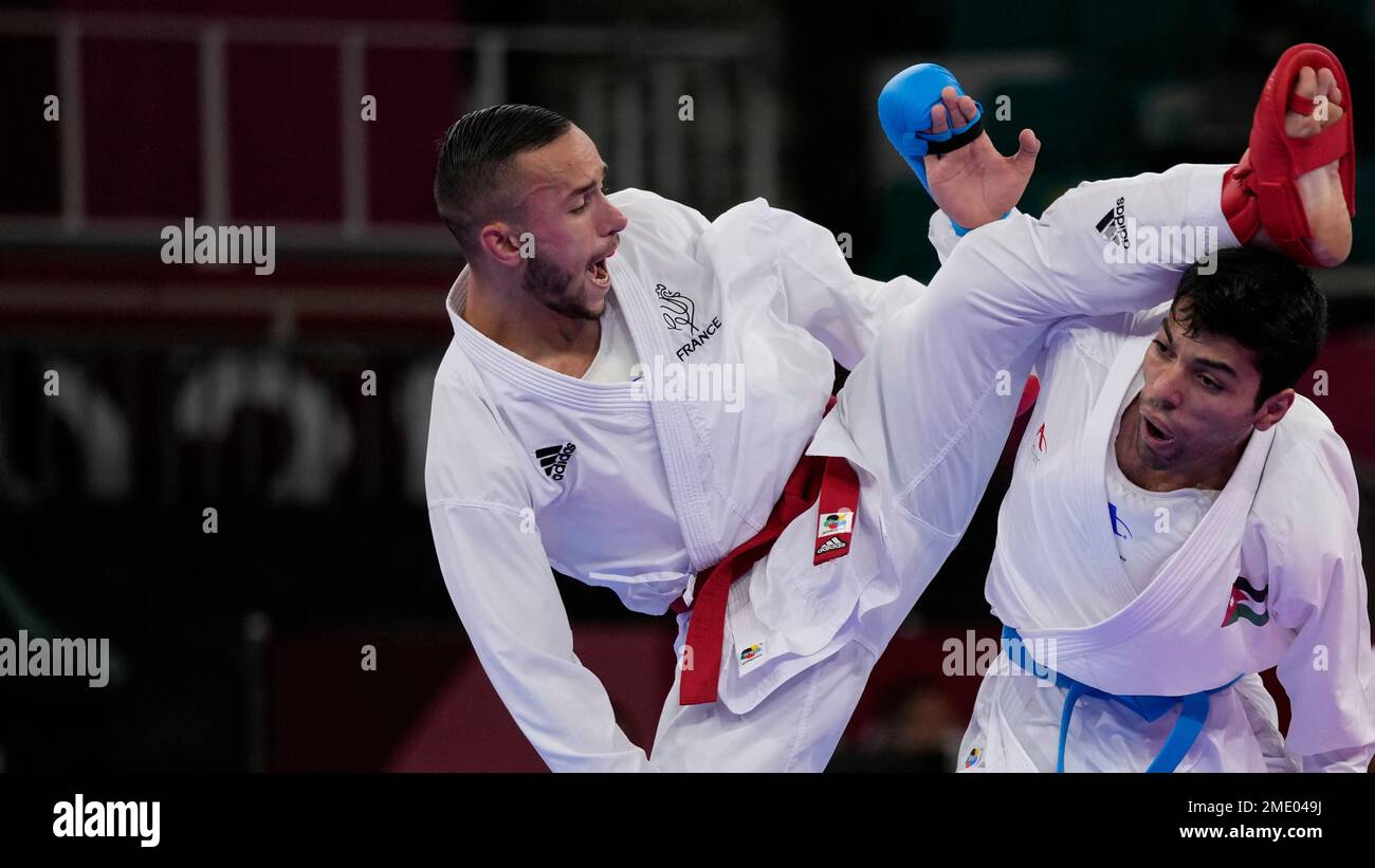Steven de Costa of France, right, and Abdel Rahman Almasatfa of Jordan  compete in the men's kumite -67kg elimination round for Karate at the 2020  Summer Olympics, Thursday, Aug. 5, 2021, in