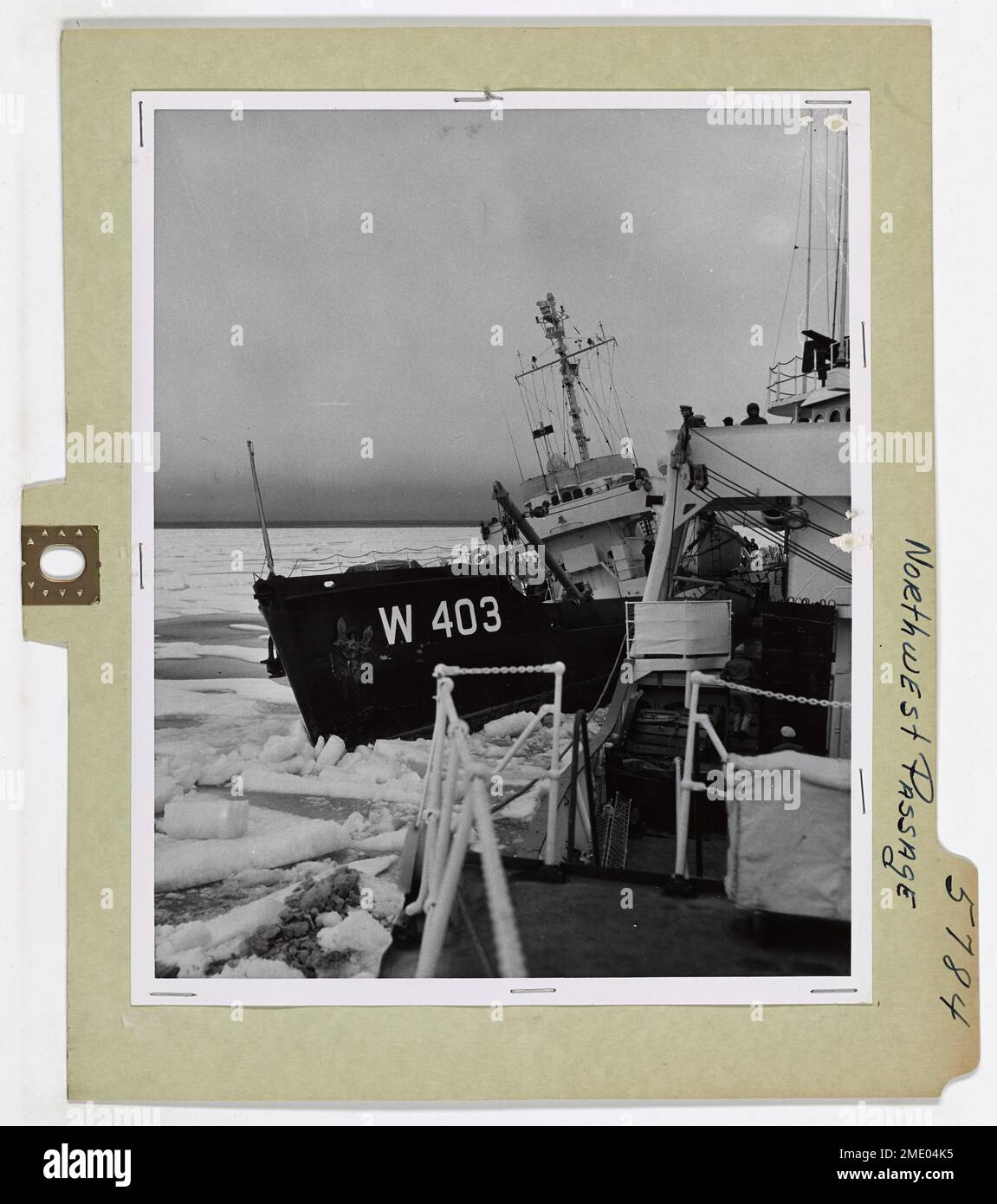 Northwest Passage. The power of Arctic ice created a few tense moments when it forced the U.S. Coast Guard buoy tender SPAR (WAGL-403) close to the Coast Guard icebreaker Storis. Both locked in ice in Amundsen Gulf, the ships battled strong winds and ice pressure (August 1957). Smart seamanship prevented serious damage, though later underwater inspection in clear waters revealed the furious north had scored. Ice had sheared a blade of the ship's crew. Breaking out from the icey grip the Spar and Storis, accompanied by a third Coast Guard ship, the Bramble continued to James Ross Strait and the Stock Photo