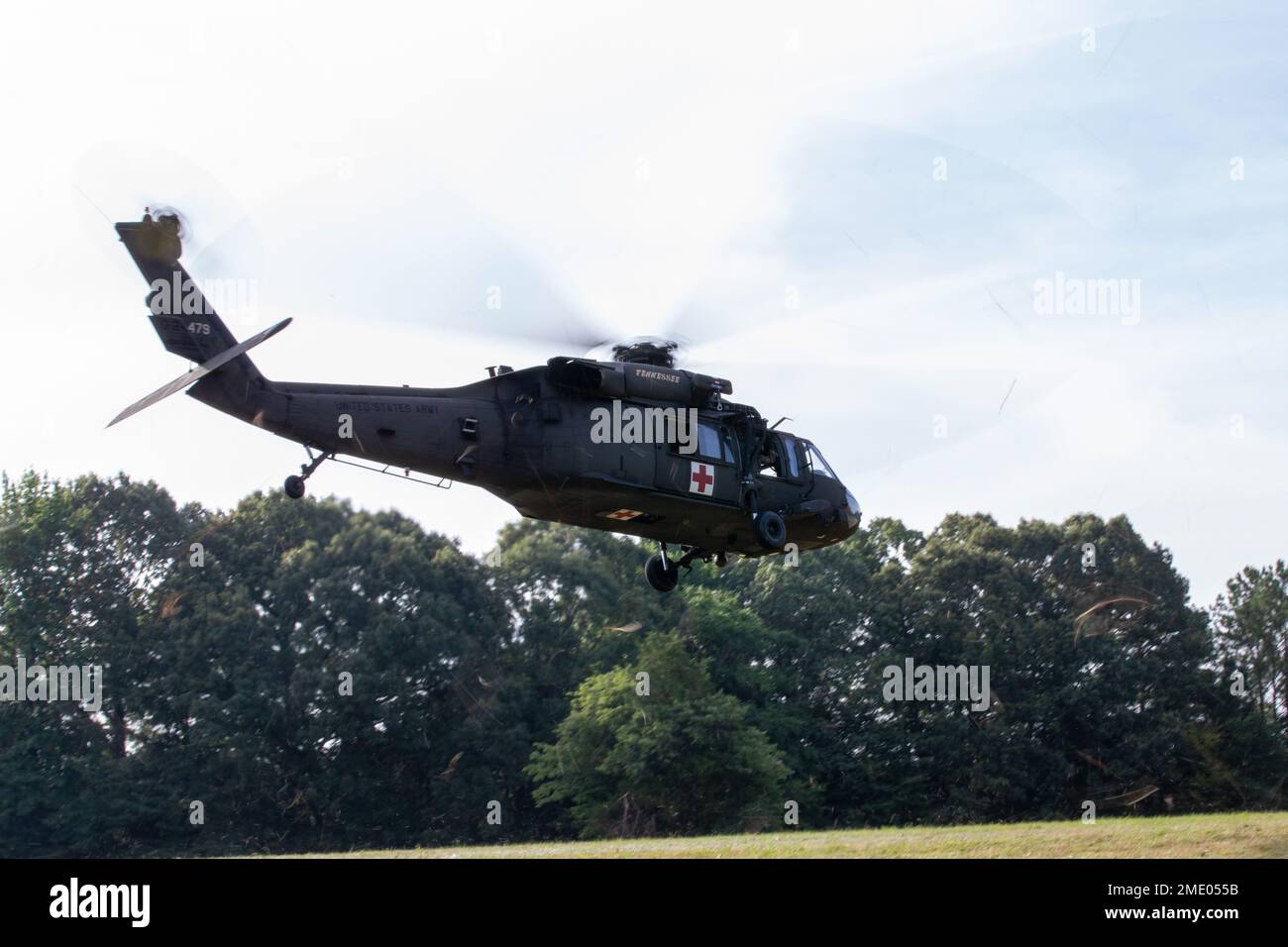 A UH60 Black Hawks takes off after competitors load a casualty at the