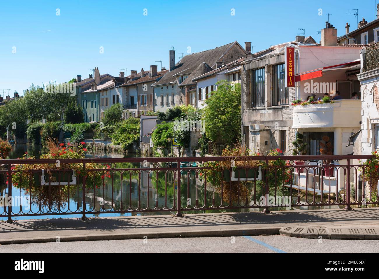 Marne France, view in summer from a bridge spanning the Marne River of scenic property in the center of the scenic French provincial town of Joinville Stock Photo