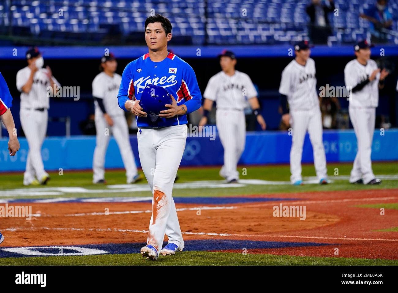 South Korea's Ji Hwan Oh walks off the field after a semi-final ...