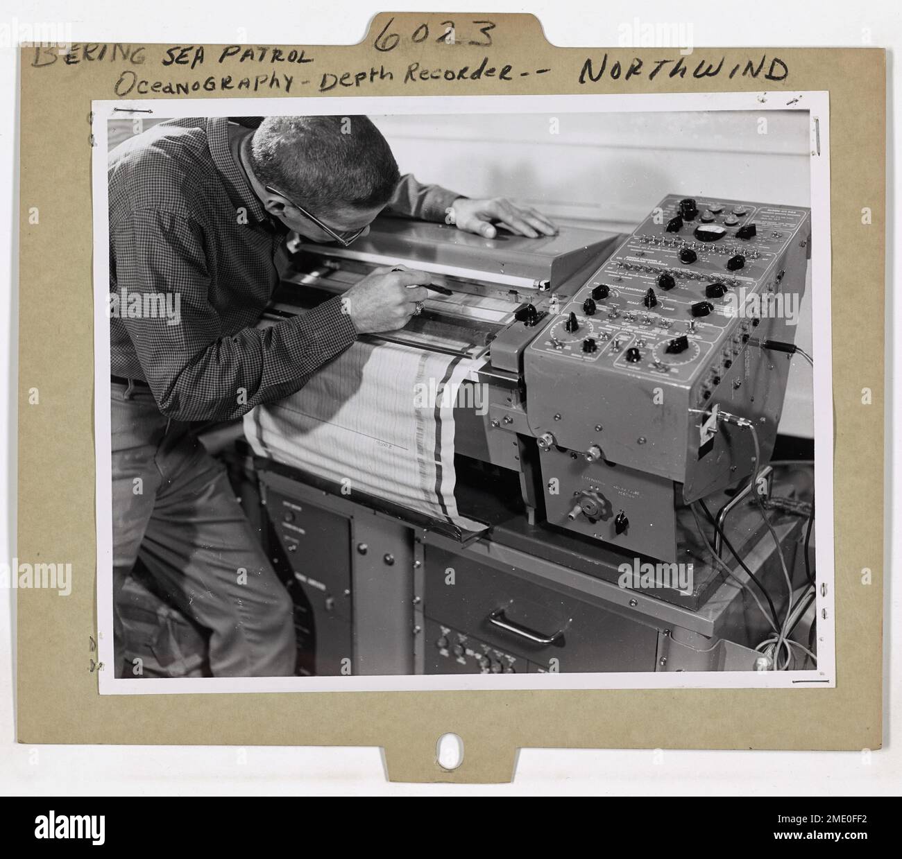 Using Ocean Depth Precision Graph Recorder. Mr. J. J. McConnell of the