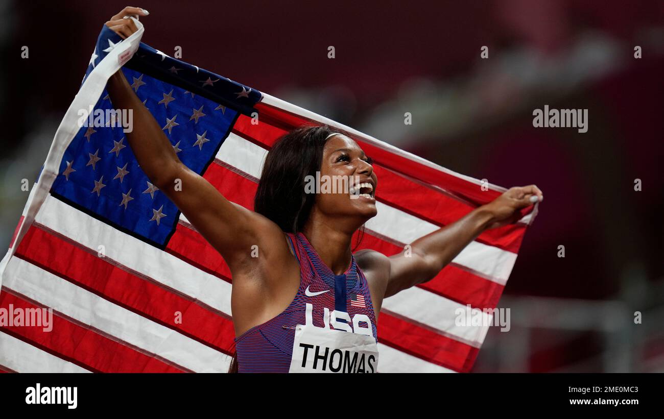 Gabrielle Thomas, of United States, celebrates after her third place