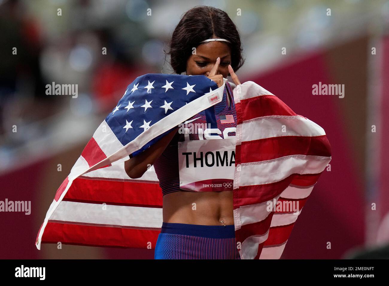 Gabrielle Thomas, of United States, celebrates after her third place