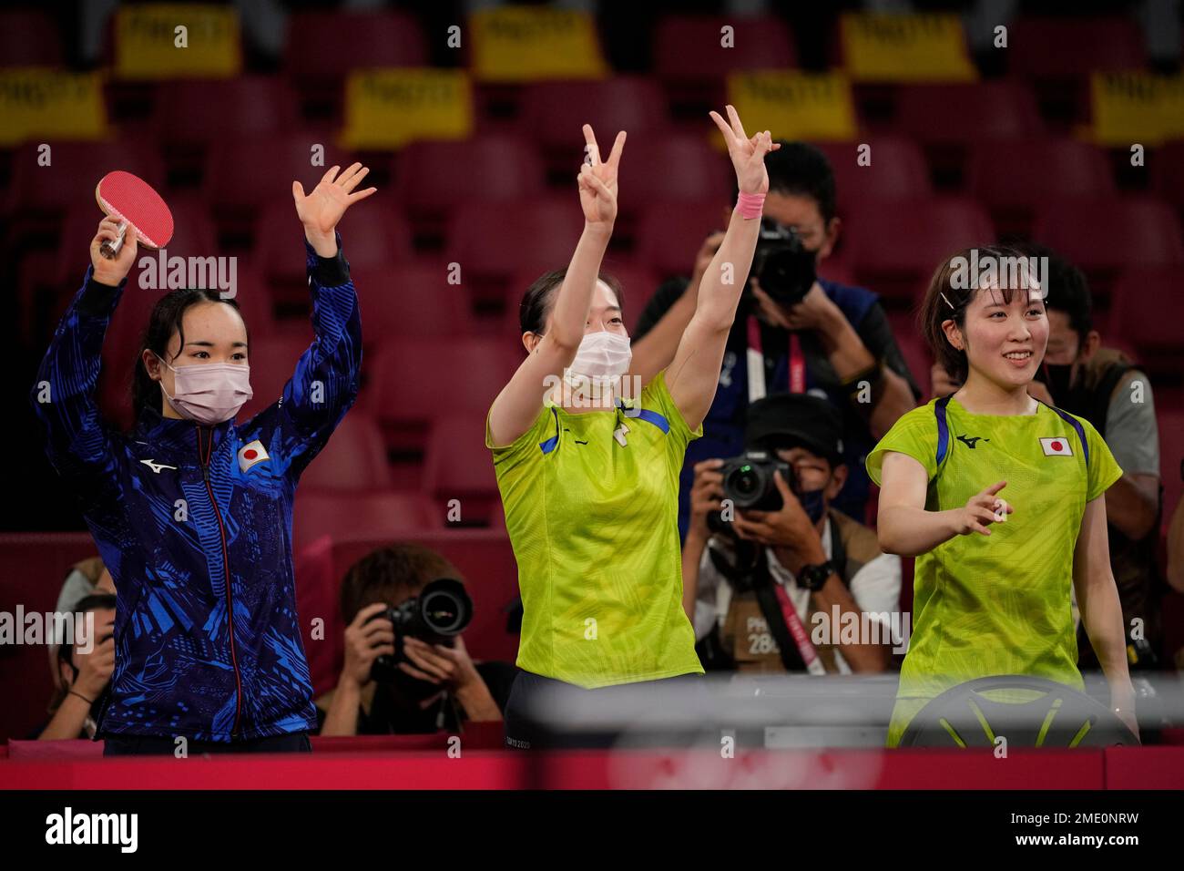 From left, Japan's Mima Ito, Kasumi Ishikawa and Miu Hirano celebrate ...