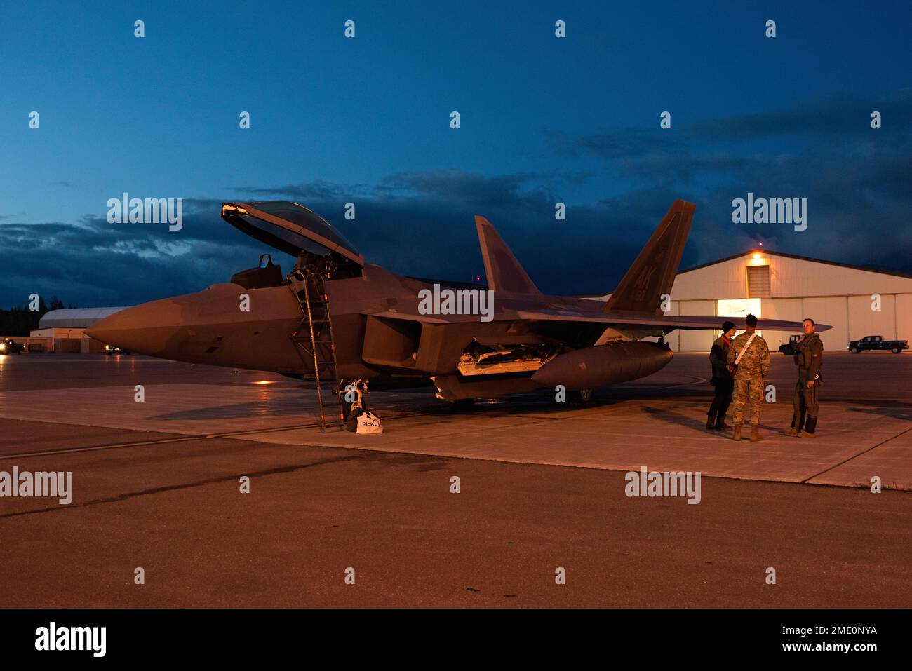 A U.S. Air Force F-22 Raptor pilot from the 90th Fighter Squadron ...