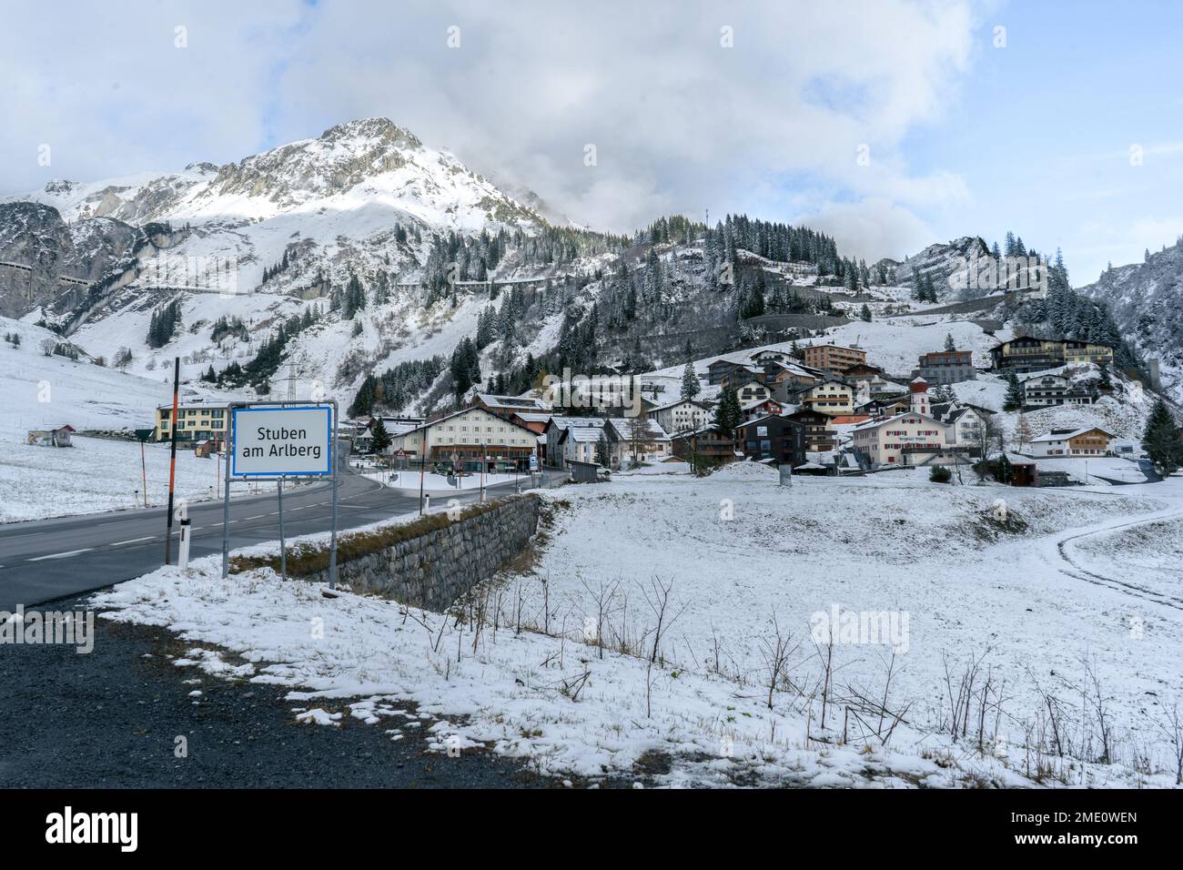 A view of the snowy mountains and the small village Stock Photo - Alamy