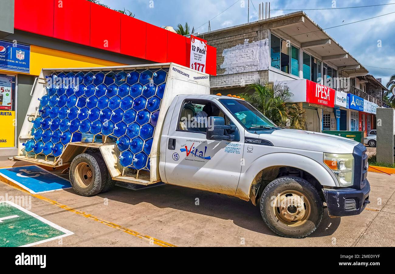 Water delivery by car in Zicatela Puerto Escondido Oaxaca Mexico Stock