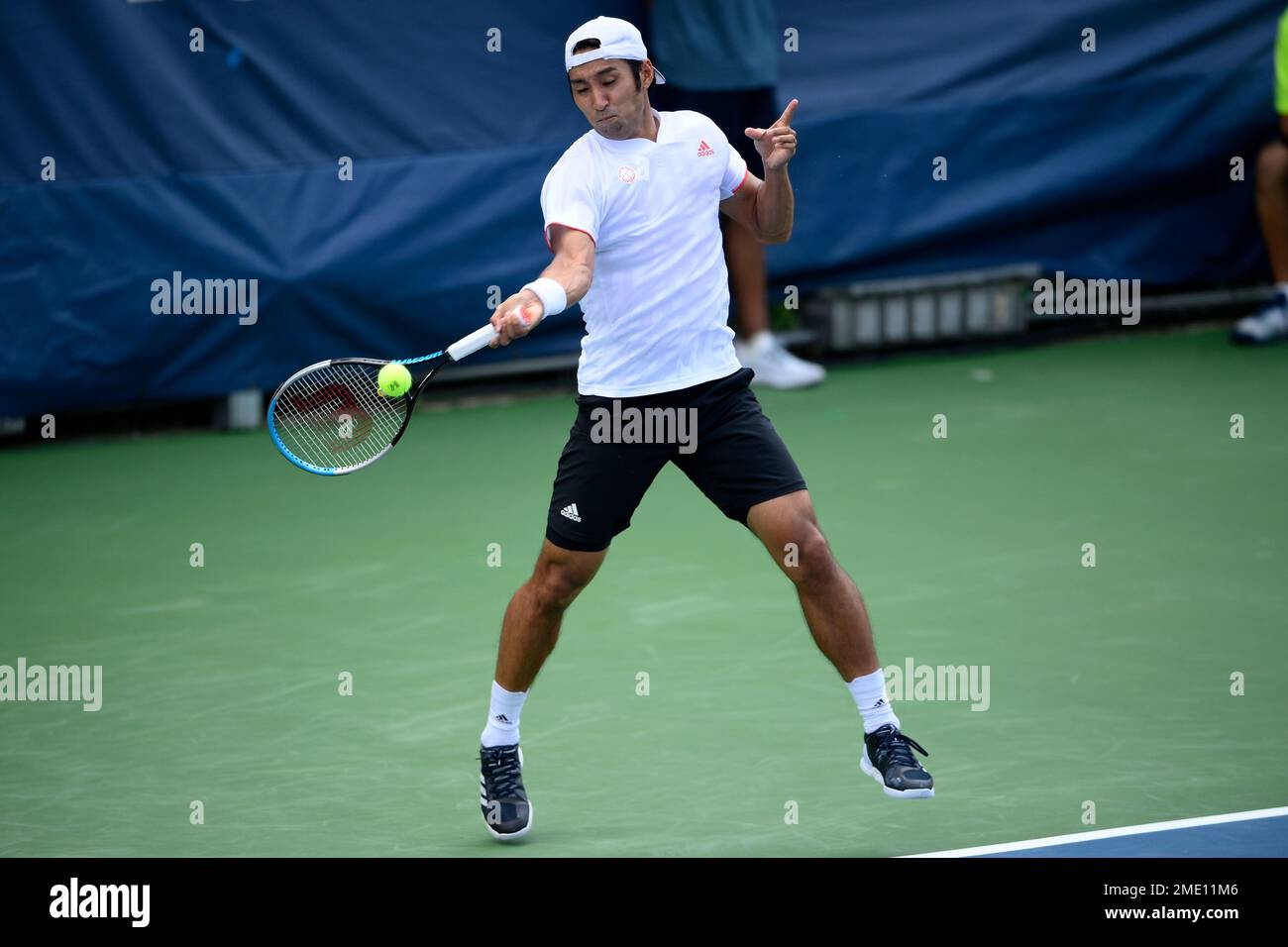 Yasutaka Uchiyama, of Japan, Andreas Seppi, of Italy, during a match in ...