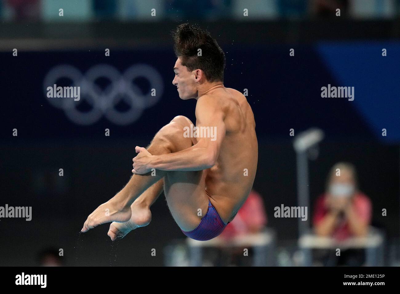 Tyler Downs of United States competes in men's diving 3m springboard