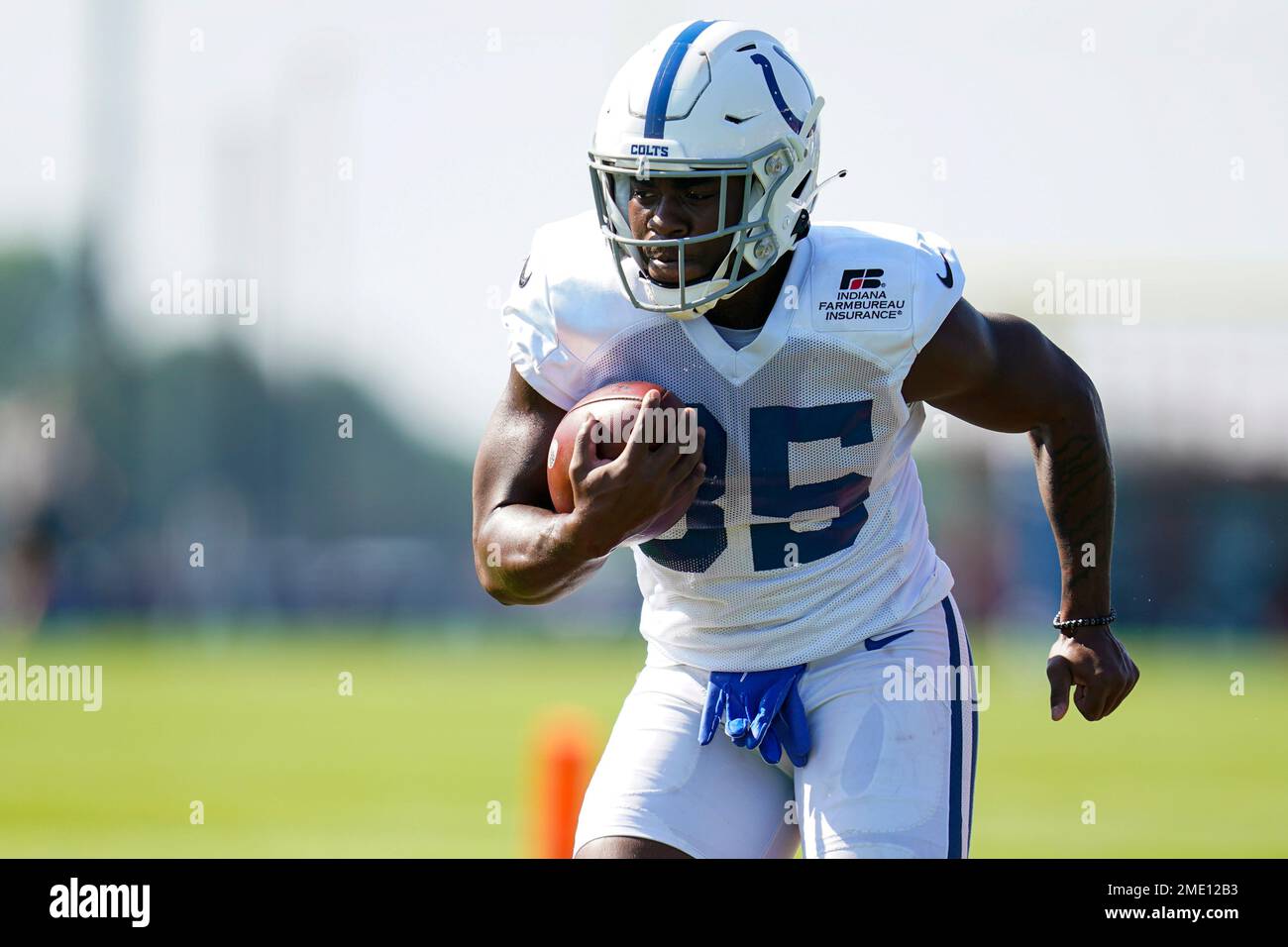 Indianapolis Colts running back Deon Jackson runs a drill during practice  at the NFL team's football training camp in Westfield, Ind., Monday, Aug.  2, 2021. (AP Photo/Michael Conroy Stock Photo - Alamy