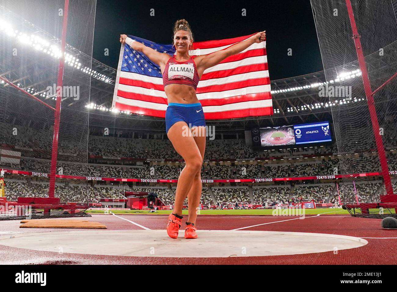 Valarie Allman, of the United States, celebrates after winning the gold