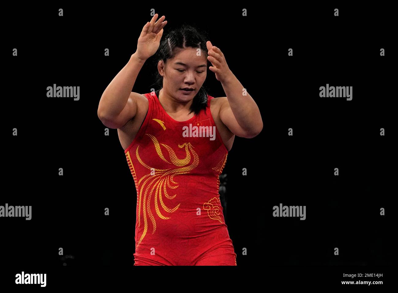 China's Zhou Qian celebrates defeating Japan's Hiroe Minagawa during ...