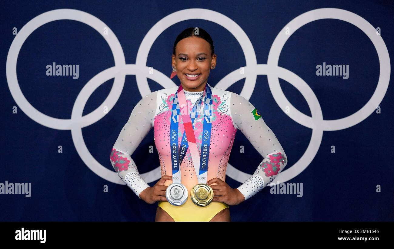 Rebeca Andrade, of Brazil, poses with her gold medal for vault and