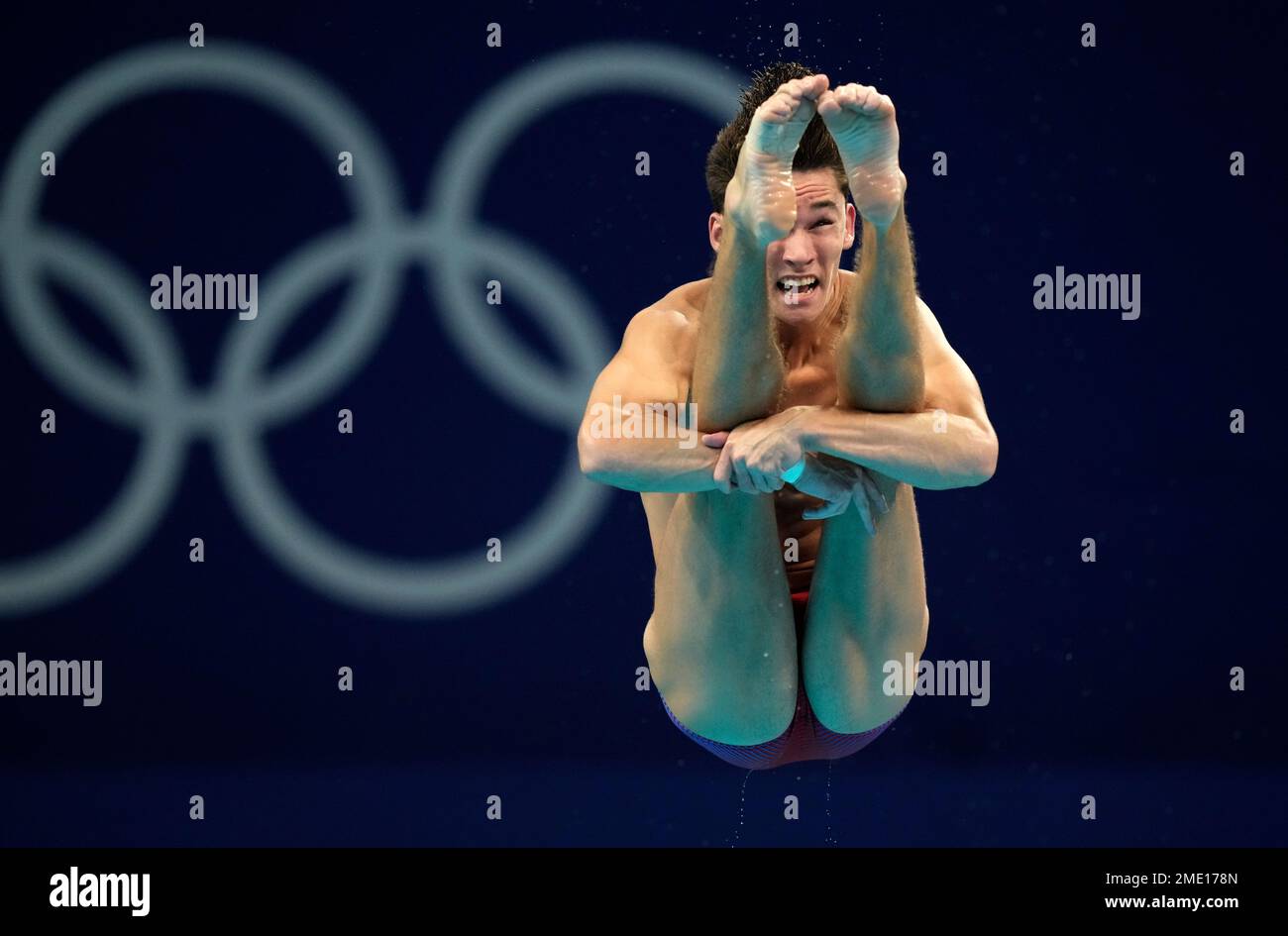 Tyler Downs of United States competes in men's diving 3m springboard preliminary at the Tokyo Aquatics Centre at the 2020 Summer Olympics, Monday, Aug. 2, 2021, in Tokyo, Japan. (AP Photo/Dmitri Lovetsky) Stock Photo