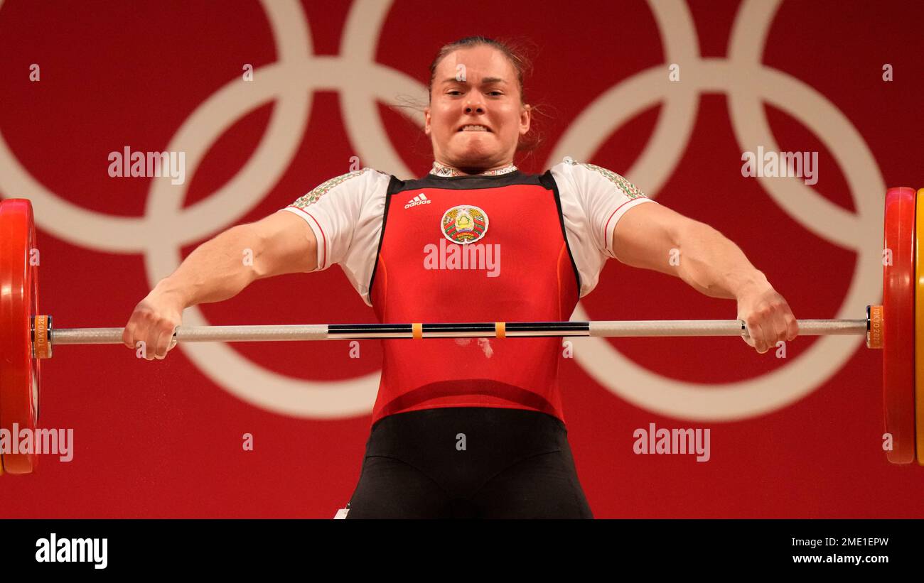 Darya Naumava of Belarus competes in the women's 76kg weightlifting