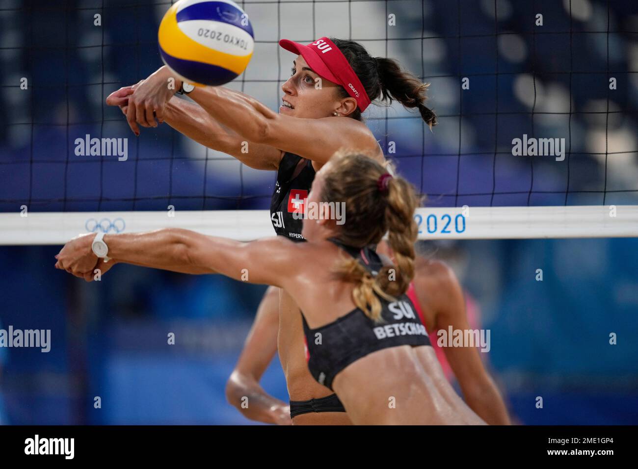 Tanja Huberli Top Of Switzerland Returns A Shot As Teammate Nina tanja-huberli-top-of-switzerland-returns-a-shot-as-teammate-nina