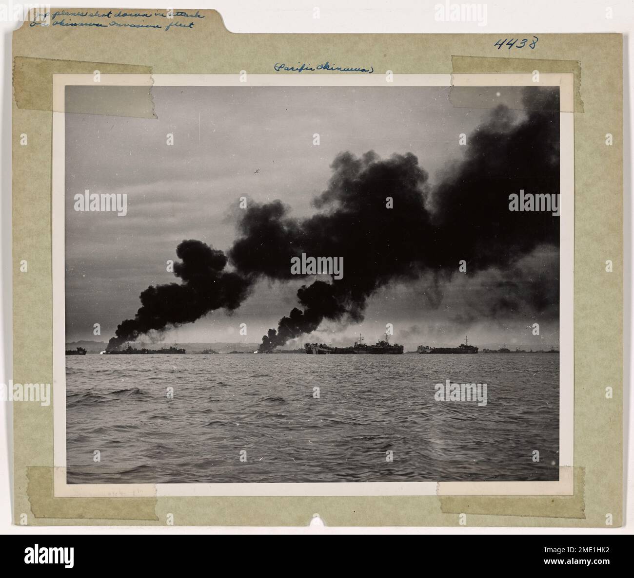 Japanese planes are seen being shot down by the American invasion fleet ...