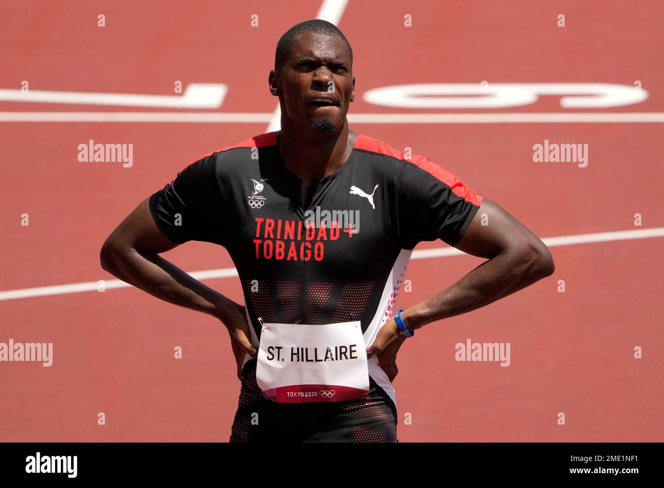 Dwight St. Hillaire, of Trinidad and Tobago, reacts after competing in