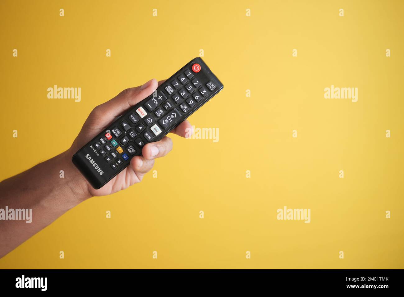 dhaka bangladesh 20 may 2022. tv remote with netflix and amazon prime