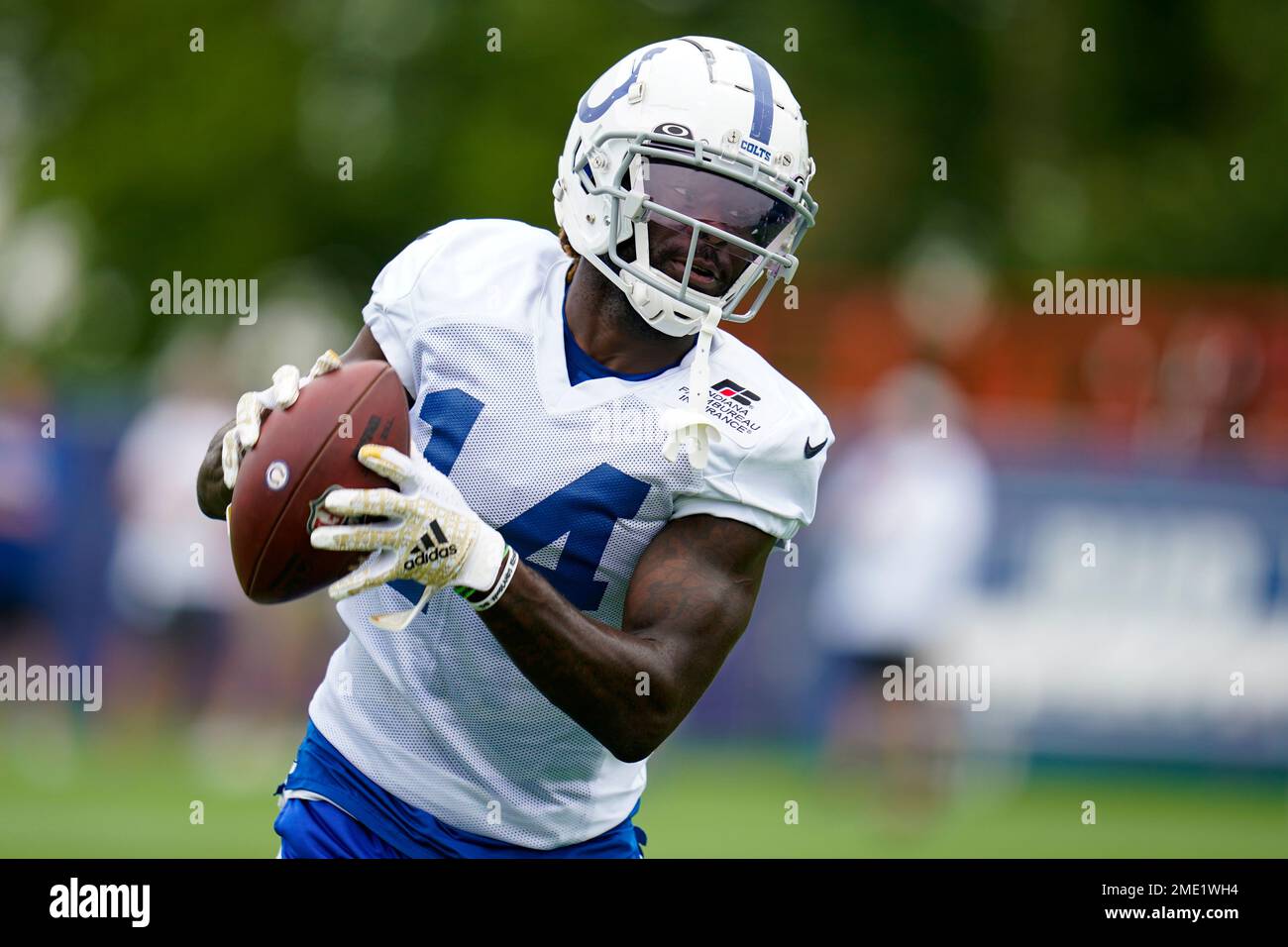 Indianapolis Colts wide receiver Zach Pascal runs a drill during practice  at the NFL team's football training camp in Westfield, Ind., Thursday, July  29, 2021. (AP Photo/Michael Conroy Stock Photo - Alamy