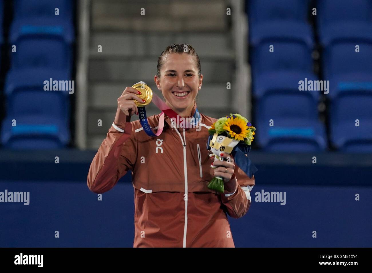 Belinda Bencic, of Switzerland, poses with the gold medal in the women ...