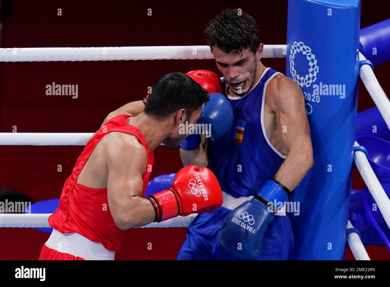 Bulgaria's Daniel Panev Asenov, left, exchanges punches with Spain's  Gabriel Escobar Mascunano during their men's flyweight 52-kg boxing match  at the 2020 Summer Olympics, Saturday, July 31, 2021, in Tokyo, Japan. (AP
