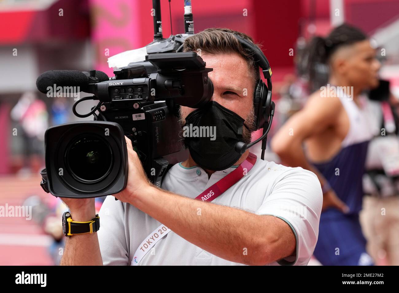 A cameraman films events during the athletics at the 2020 Summer ...