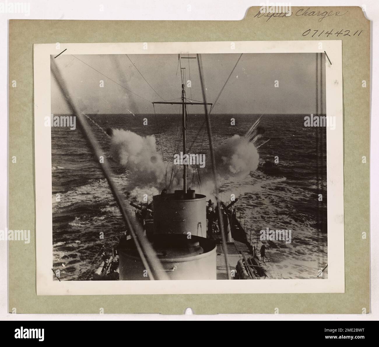 This image depicts a depth charge being deployed from a ship Depth This image depicts a depth charge being deployed from a ship Depth