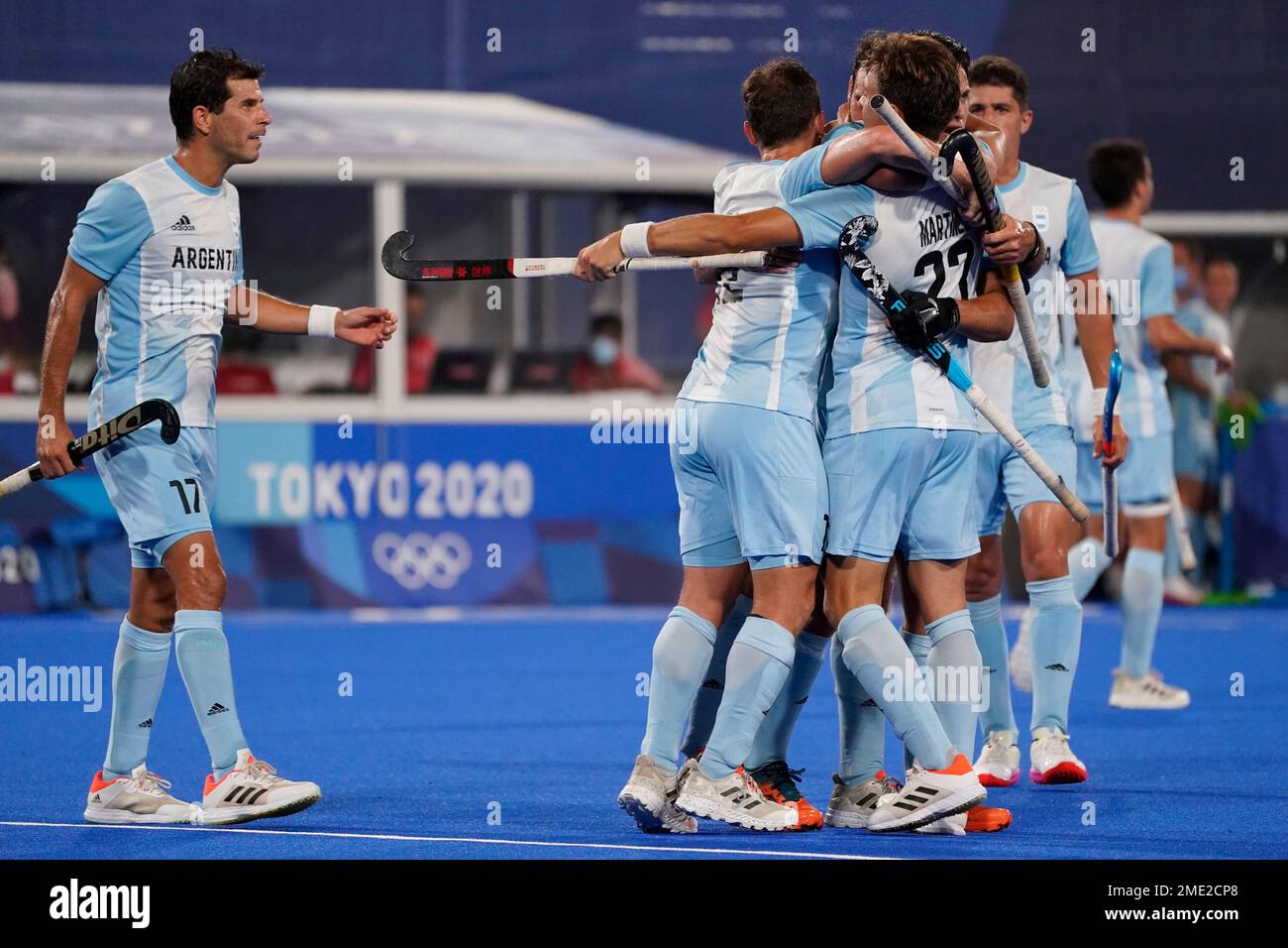 Team Argentina celebrates after New Zealands Dane Lett scores on his own goal during a mens field hockey match at the 2020 Summer Olympics, Friday, July 30, 2021, in Tokyo, Japan