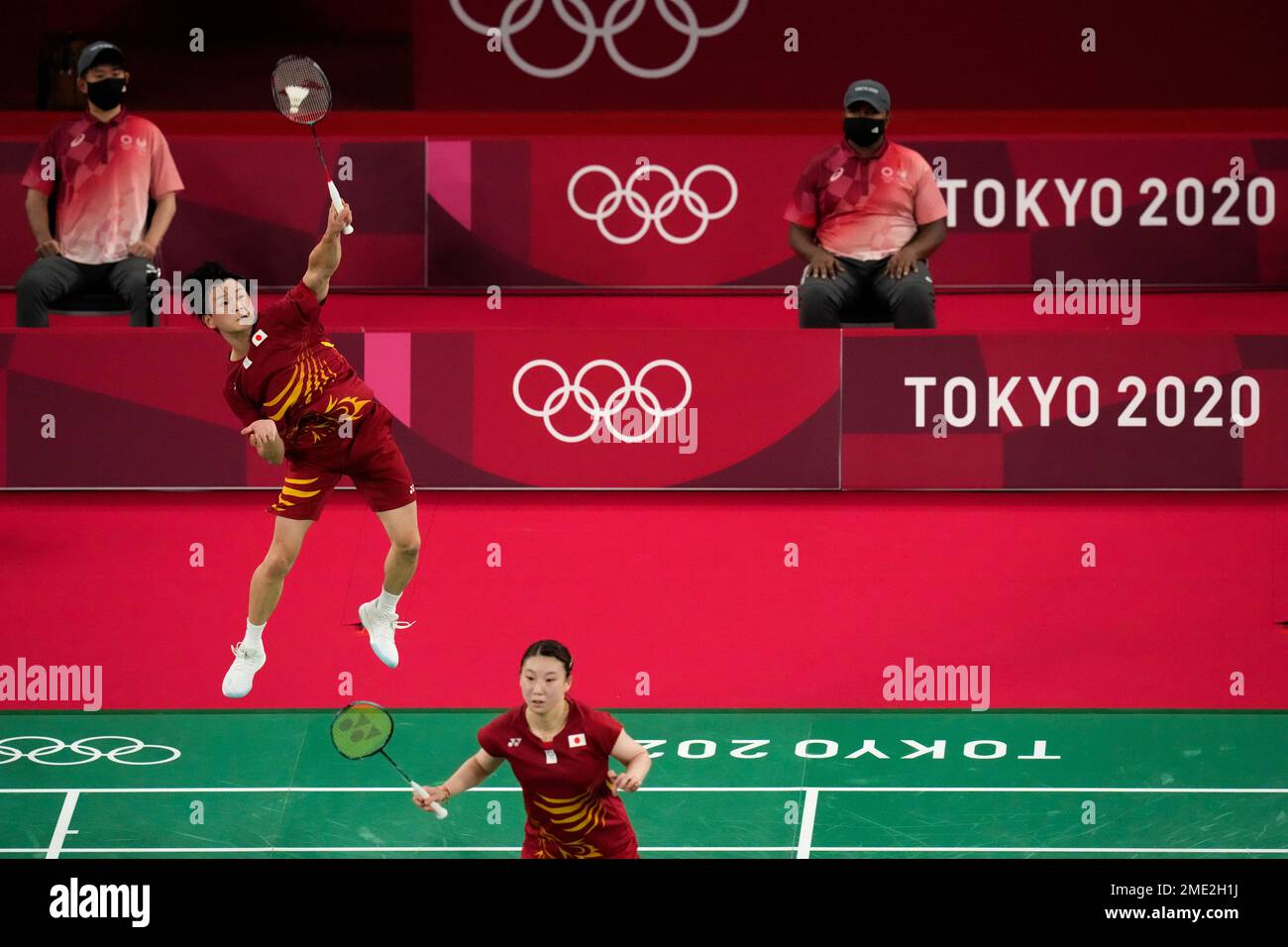 Japan's Yuta Watanabe, right, and Arisa Higashino play against Hong