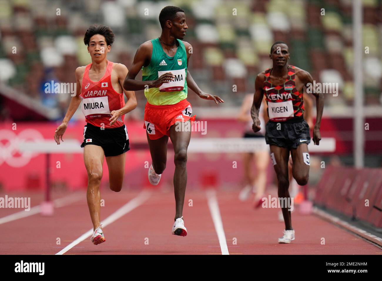 Lamecha Girma, of Ethiopia, wins in a heat of the men's 3,000meter