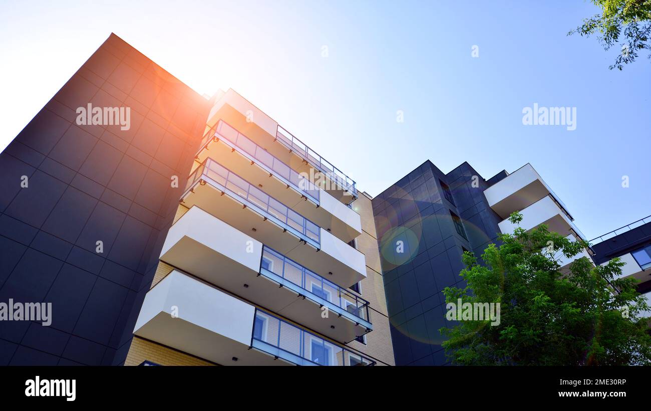 Modern residential building with new apartments in a green residential ...