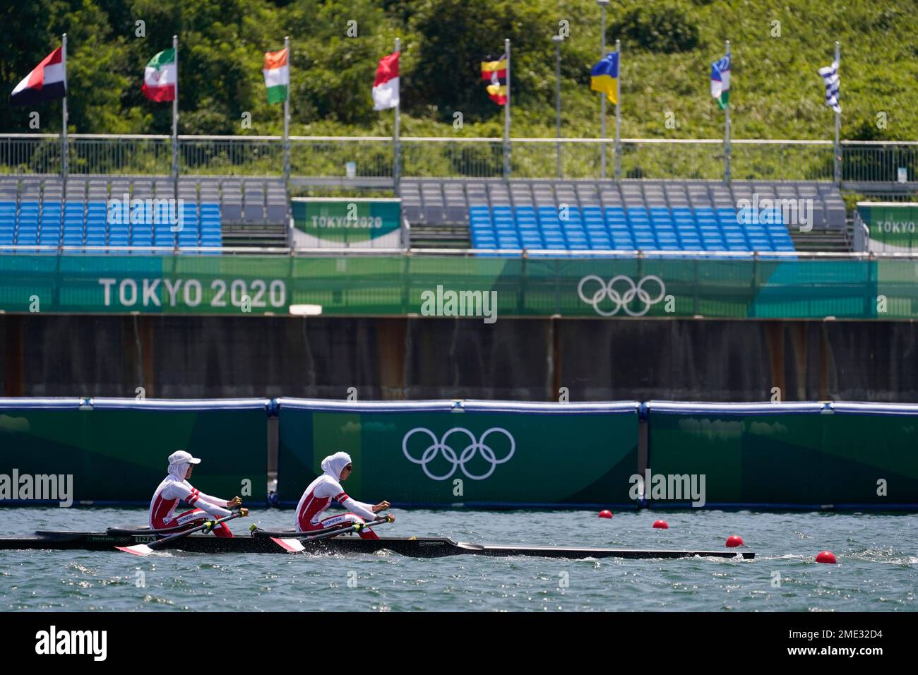 Mutiara Putri and Melania Putri of Indonesia compete in the lightweight  women's rowing double sculls final