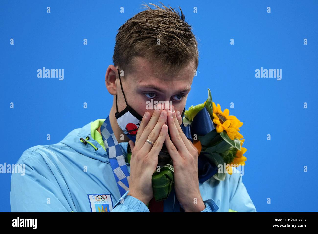 mykhailo-romanchuk-of-ukraine-stands-on-the-podium-after-receiving-his