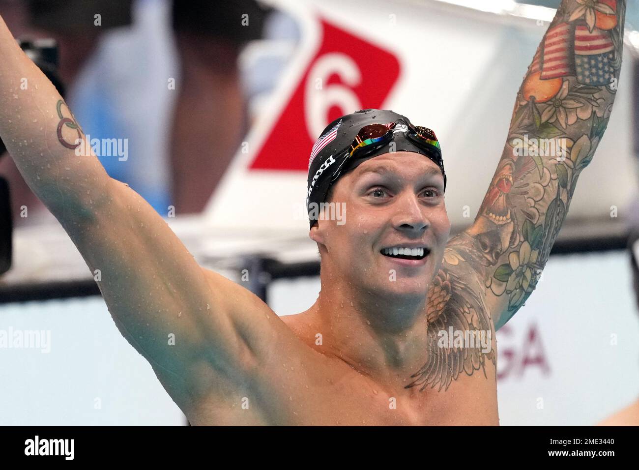 Caeleb Dressel of the United States celebrates winning the men's 100 ...