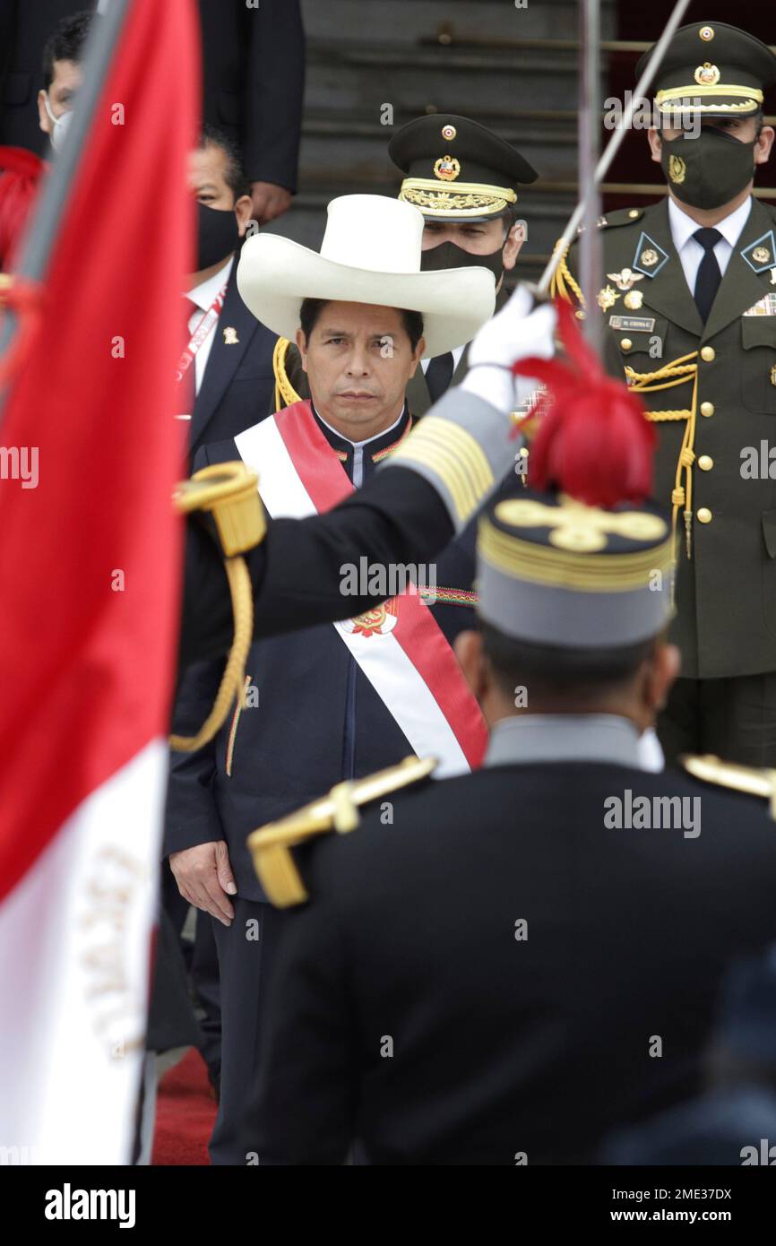 Peru's newly sworn-in President Pedro Castillo acknowledges soldiers ...