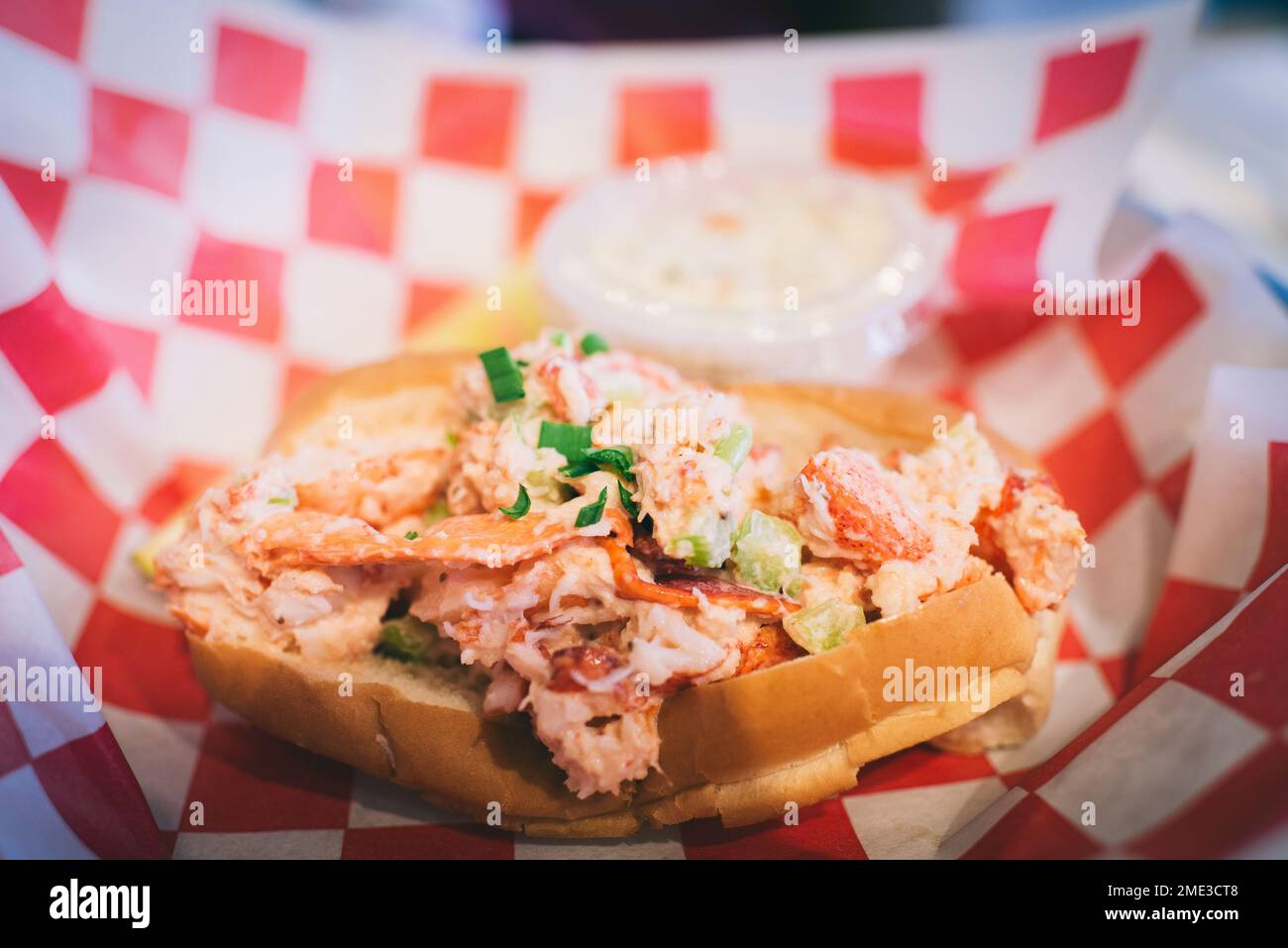 Crab roll on a red checkers plate at a local restaurant Stock Photo Alamy