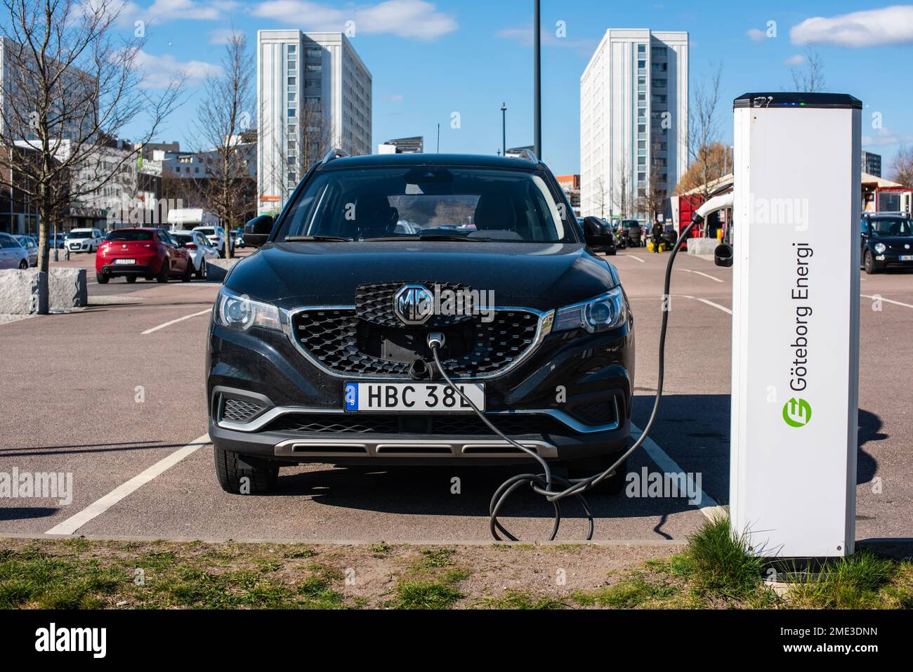 Gothenburg, Sweden April 23 2022 Black MG ZS EV car charging at a mall parking lot Stock