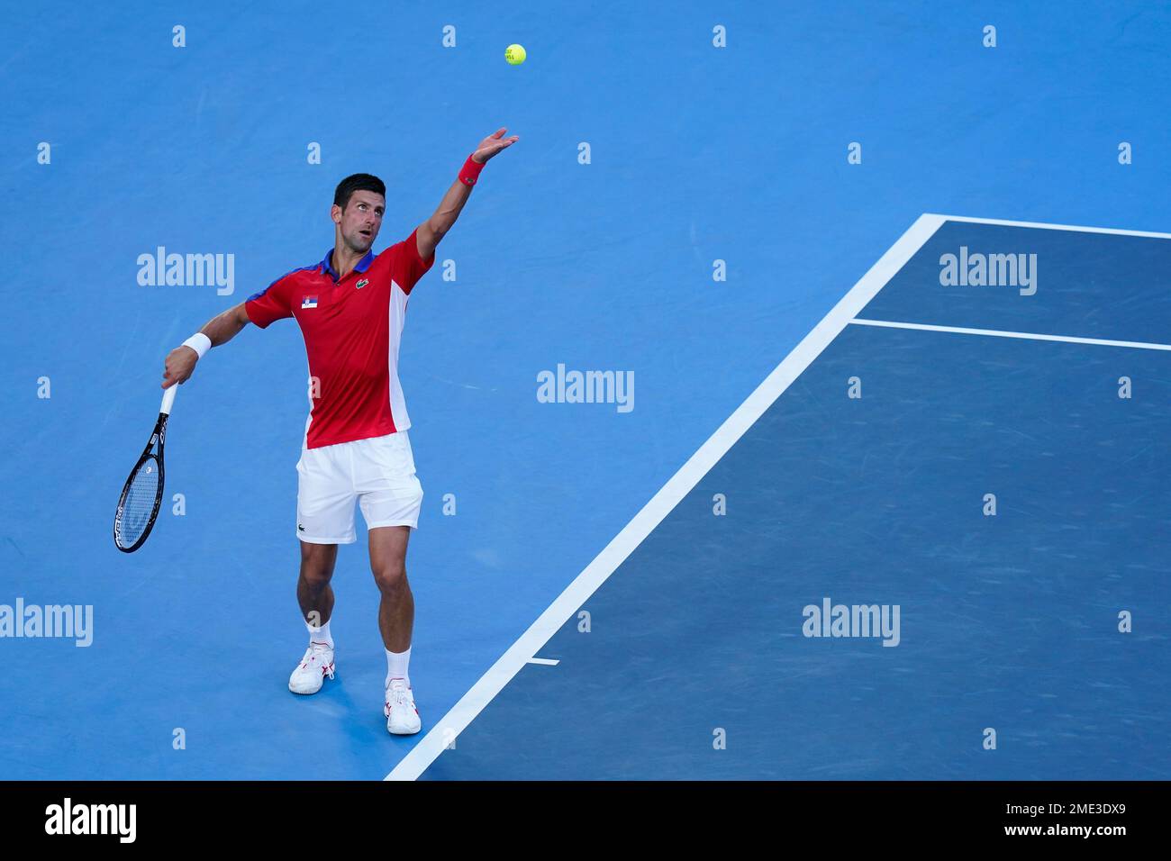 Novak Djokovic, of Serbia, serves to Alejandro Davidovich Fokina, of Spain, during the third round of the mens tennis competition at the 2020 Summer Olympics, Wednesday, July 28, 2021, in Tokyo, Japan