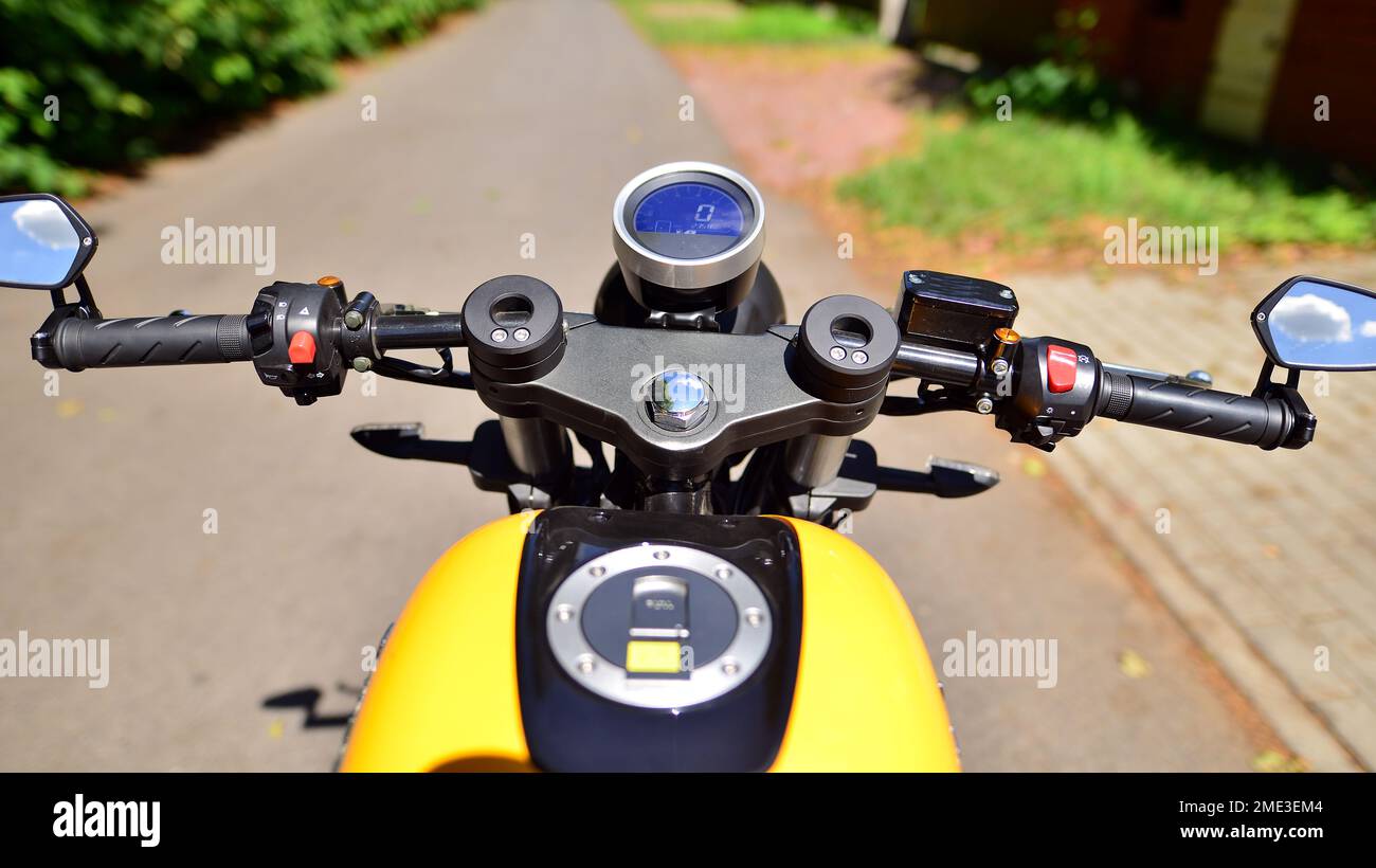 Handlebars and speedometer of motorbike Stock Photo