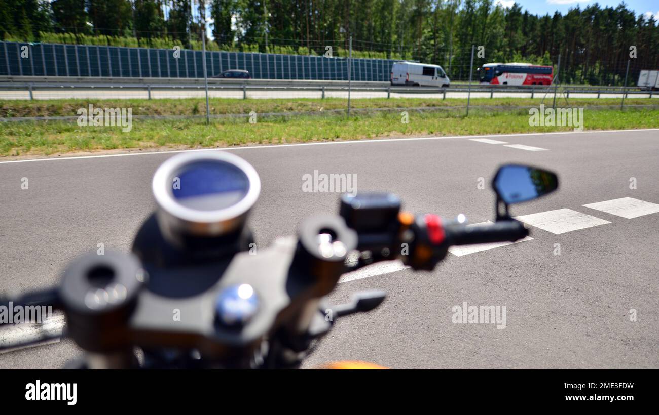 Handlebars and speedometer of motorbike Stock Photo